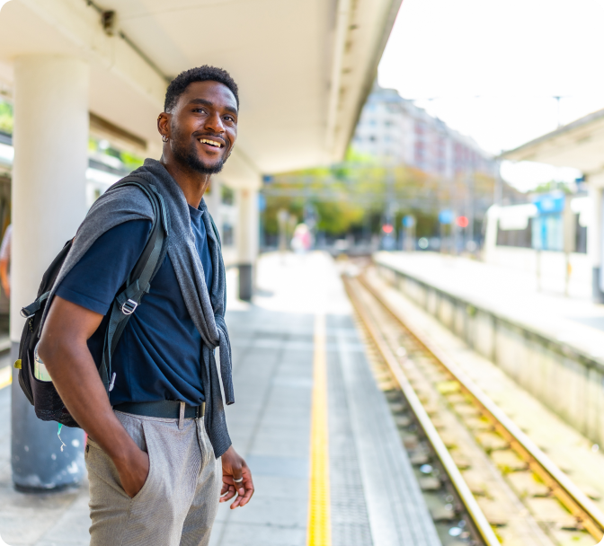Young man at train platform